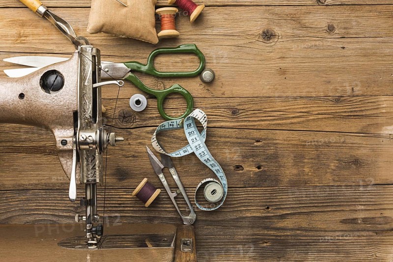 Top view of vintage sewing machine with scissors and thread. Resolution and high quality beautiful photo