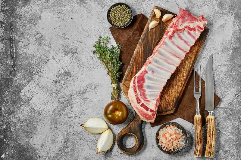 Top view of raw uncooked lamb breast and flap