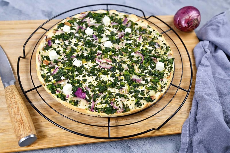 Tarte Flambee or Flammkuchen a thin pizza-like baked pie from German-French Alsace border region