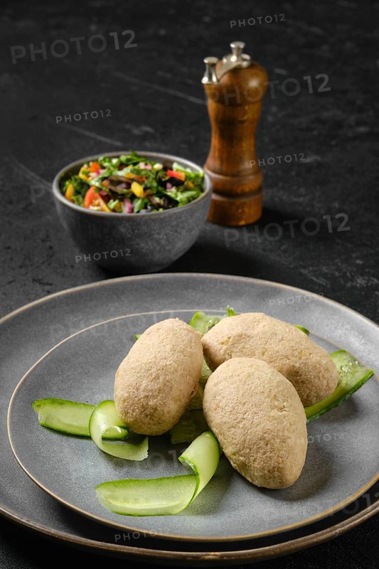 Semifinished frozen cepelinai. Potato dumplings stuffed with ground meat