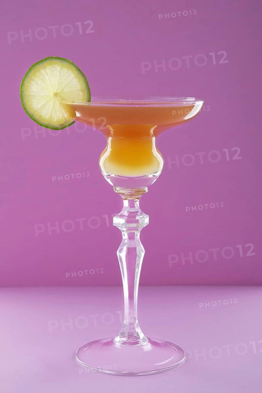 Cocktail brown derby on violet background