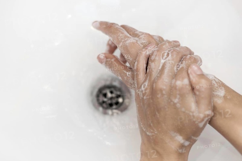 Top view person washing hands with soap. Resolution and high quality beautiful photo
