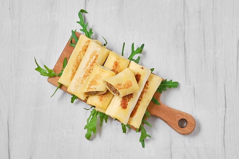 Thin crepe stuffed with chicken offal