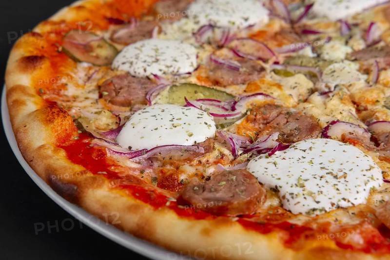 Closeup photo of pizza with sausage