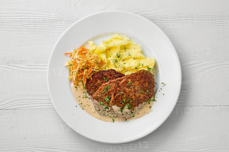 Top view of plate with liver cutlet