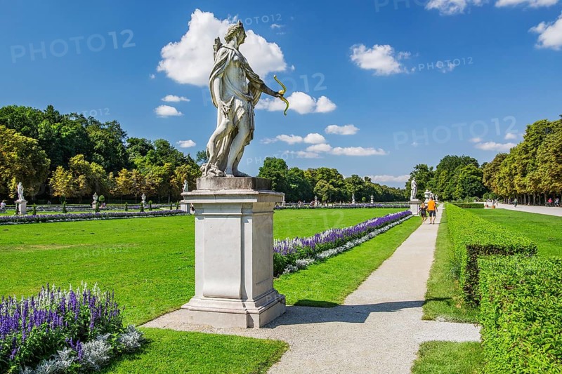 Baroque garden parterre with sculptures in the palace park of Nymphenburg Palace