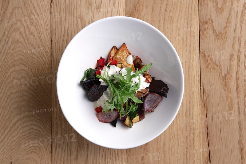 Top view of hot salad with deep fried beetroot
