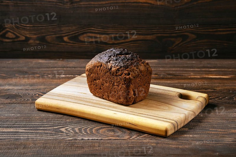 Loaf of artisan rye bread on a table