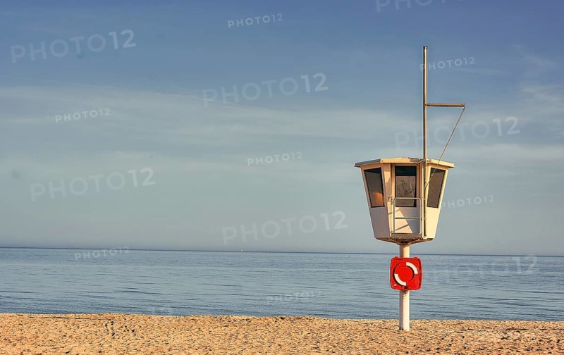 Rescue tower on the empty beach of the seaside resort of Dahme