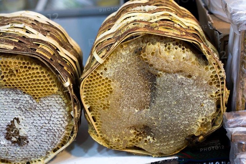 Sweet fresh honey in the sealed comb frame
