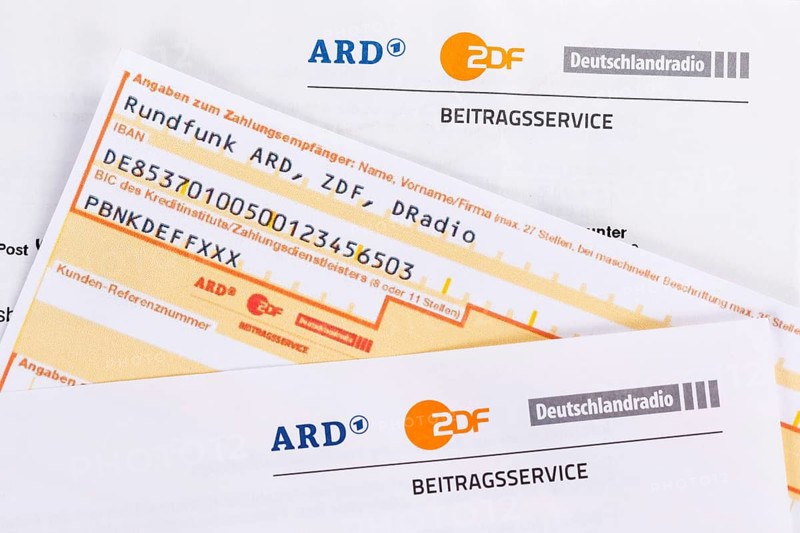 Contribution service of ARD and ZDF Rundfunkgebuehr GEZ with remittance slip in Stuttgart