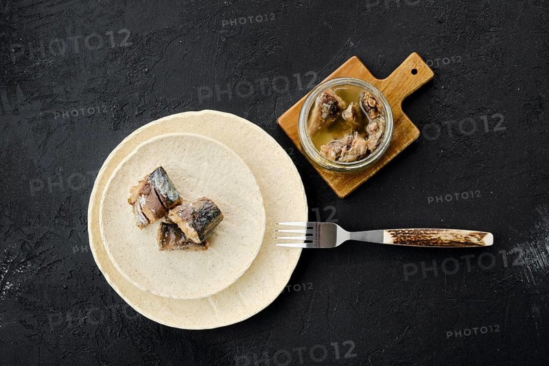 Top view of canned mackerel on a plate