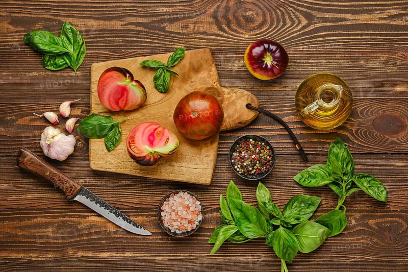 Top view of preparation of spicy tomato salad