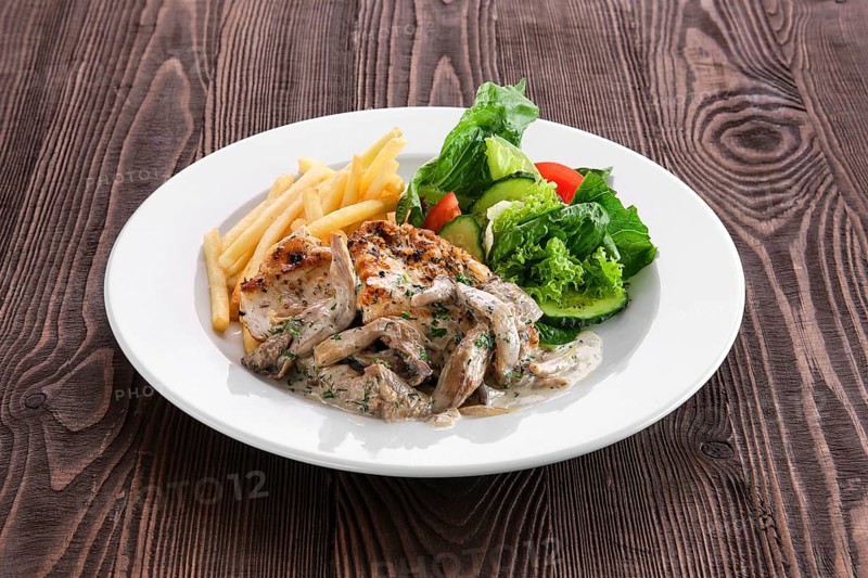 Grilled chicken fillet with oyster mushrooms