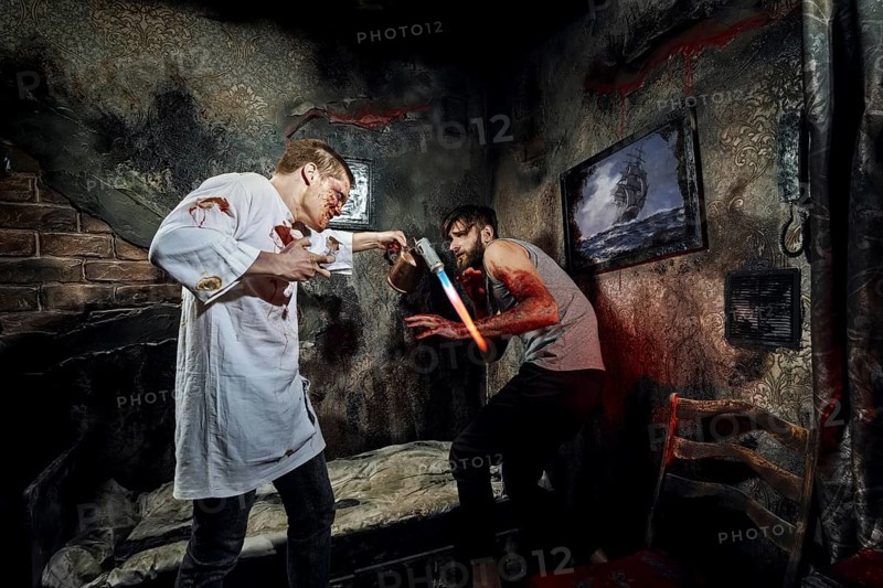 Psycho killer tortures with gas burner miserable bleeding victim