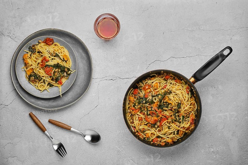 Overhead view of spaghetti with spinach