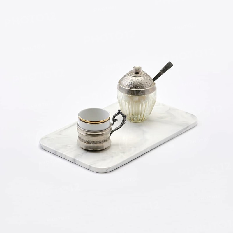 Vintage porcelain coffee cup in silver holder and sugar bowl with little spoon