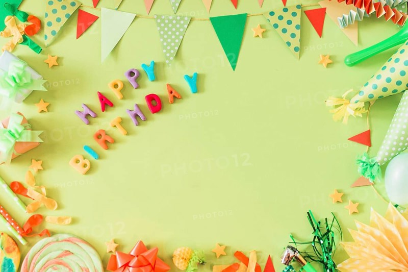 Happy birthday text with accessories green background