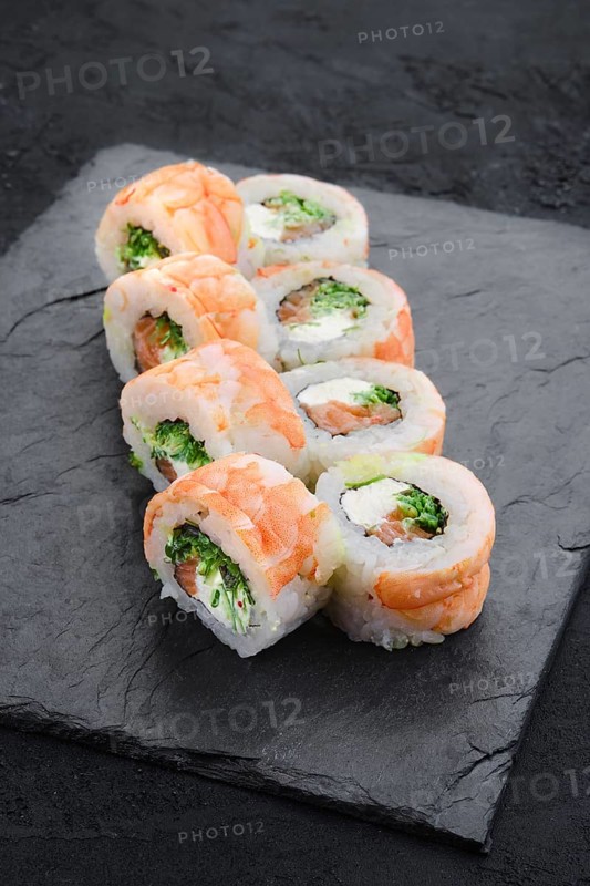 Rolls with shrimp and cream cheese on slate plate