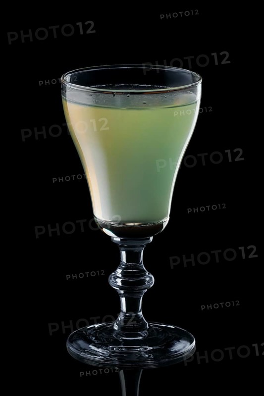 Glass of daiquiri cocktail isolated on black background background