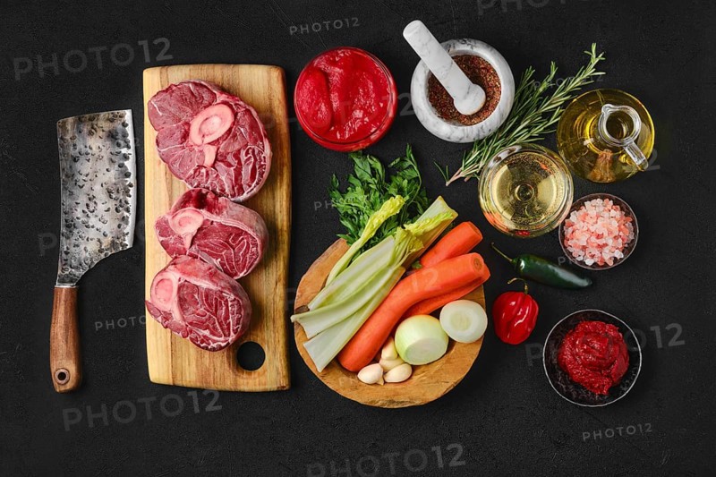 Overhead view of ingredients for preparation of ossobuco
