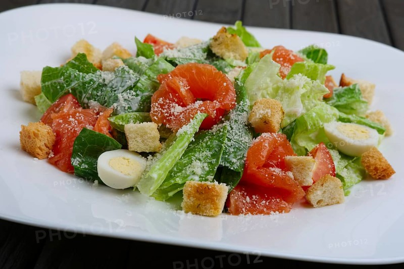 Close up photo of salad with quail egg