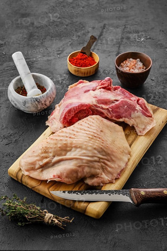 Raw fresh turkey thigh with spices