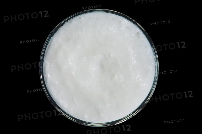 Top view of glass of smoothies isolated on black