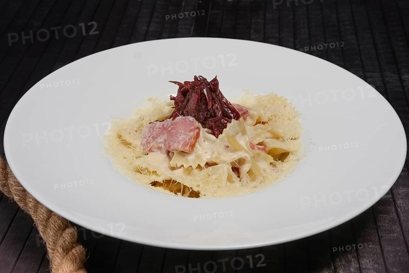 Big plate of pasta with ham