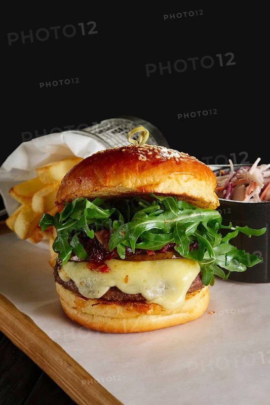 Juicy beef burger with lingonberry sauce