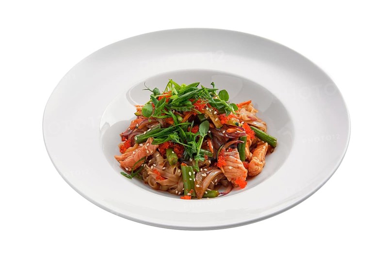 Wok with salmon and green beans isolated on white background