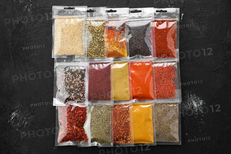 Overhead view of different spices in plastic package