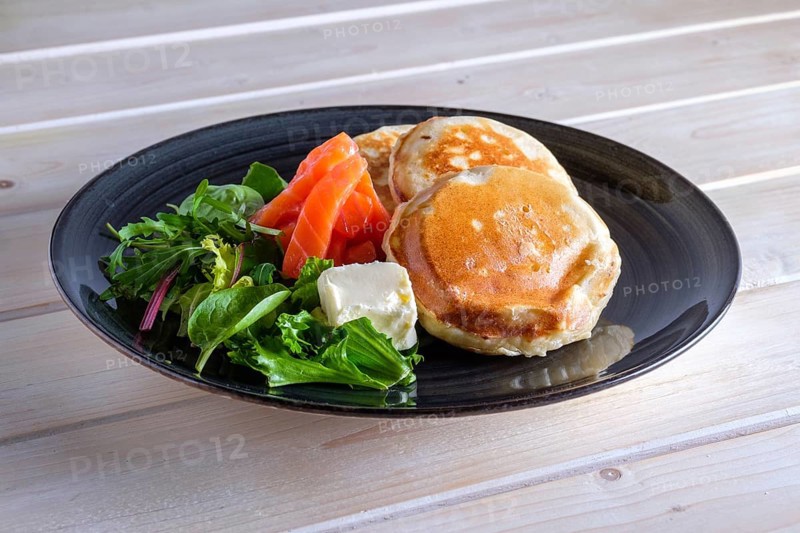 Flapjacks with salmon and fresh salad
