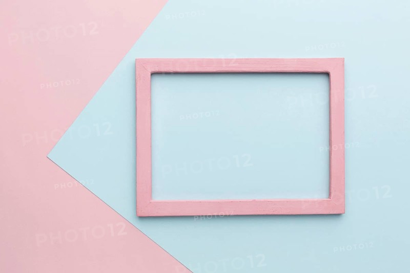 Flat lay beautiful pink wooden frame concept