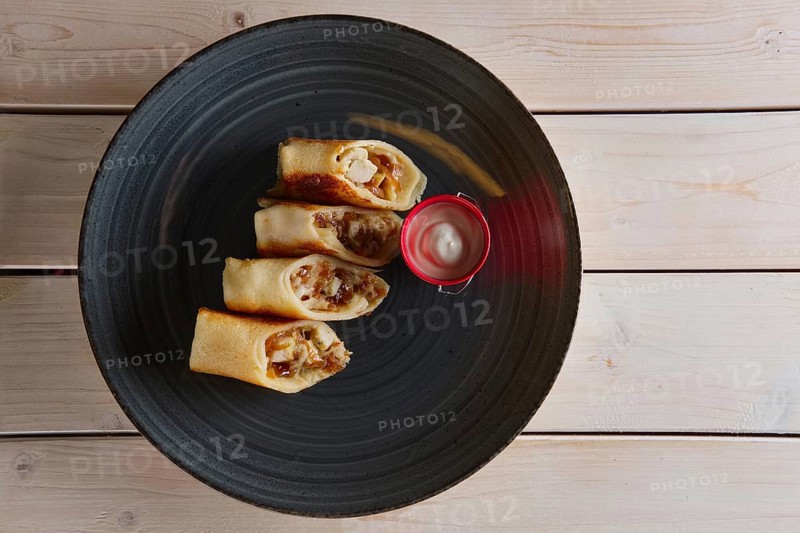 Thin pancakes with ham