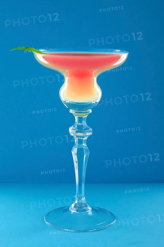 Classic Scofflaw cocktail on blue background
