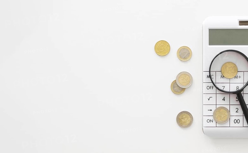 Magnifier calculator with copy space coins