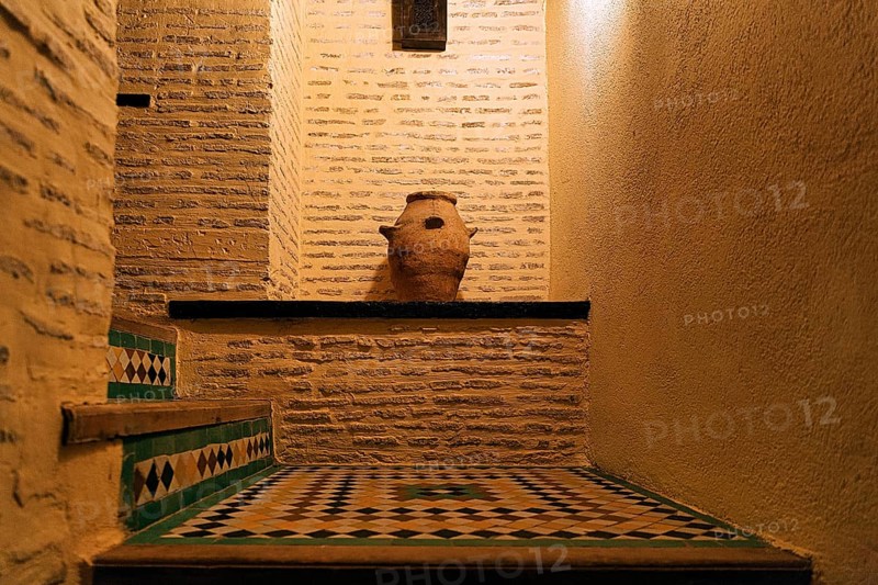 Decorative jug in a wall niche