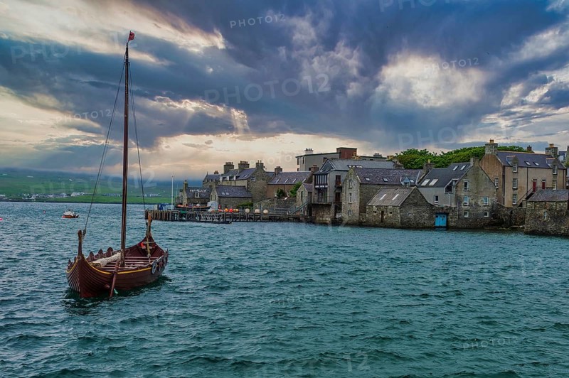 Old viking boat before the seafront of Lerwick