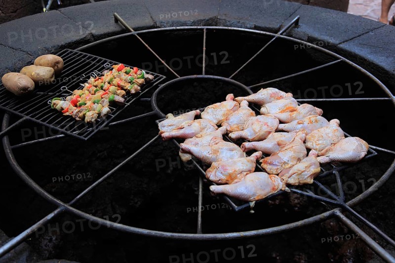 Barbecue in El Diablo restaurant heated with the heat of the volcano. Timanfaya National Park