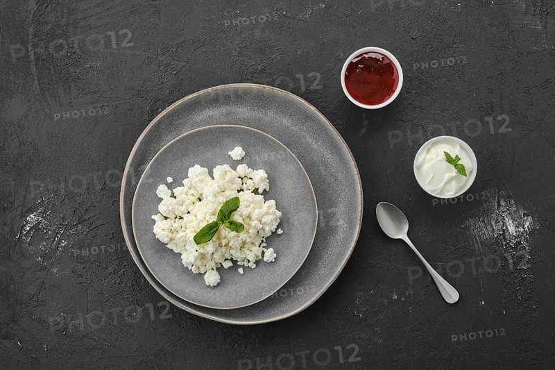 Fresh homemade cottage cheese on a plate