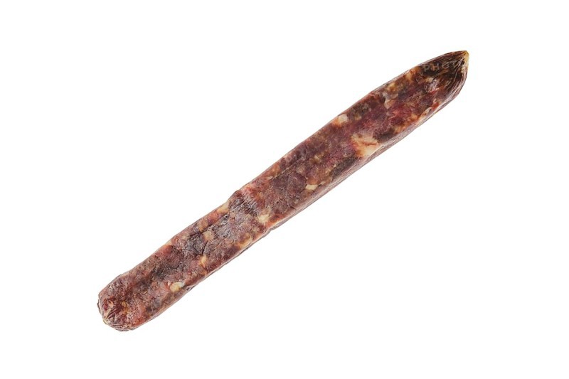 Top view of dried jerked deer and pork sausage isolated on white background
