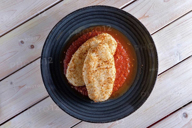 Cutlet in breading with adjika sauce