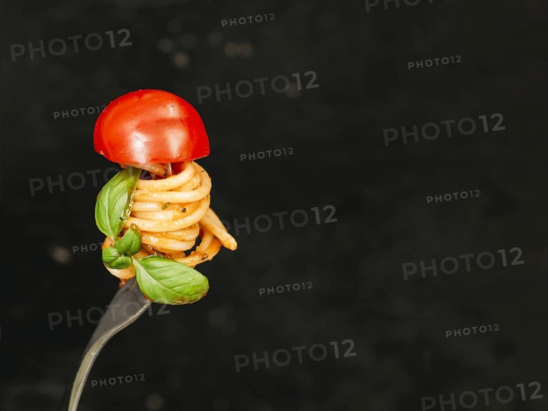 Tasty spaghetti wrapped around fork. Resolution and high quality beautiful photo