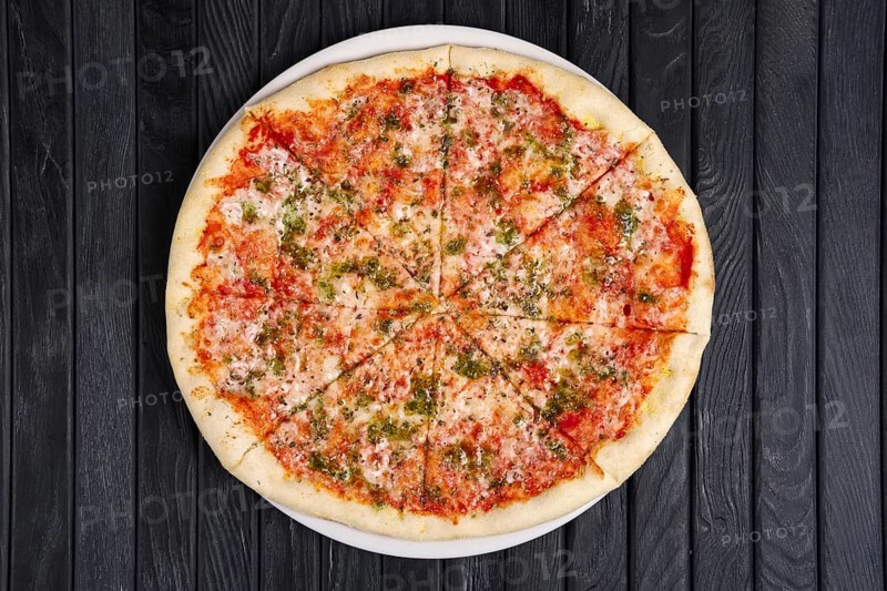 Top view of pizza with melted cheese