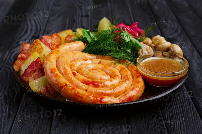 Homemade fried sausage with potato