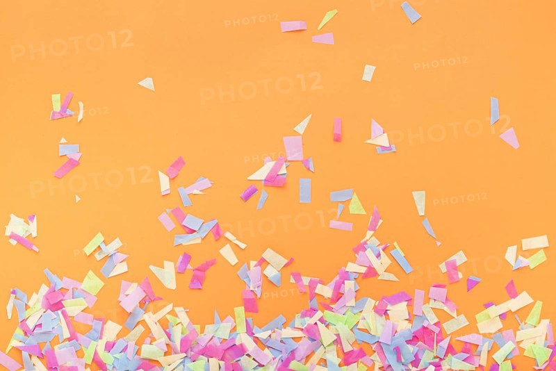 Colorful confetti orange background