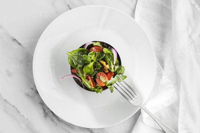 Top view delicious salad white plate. Resolution and high quality beautiful photo