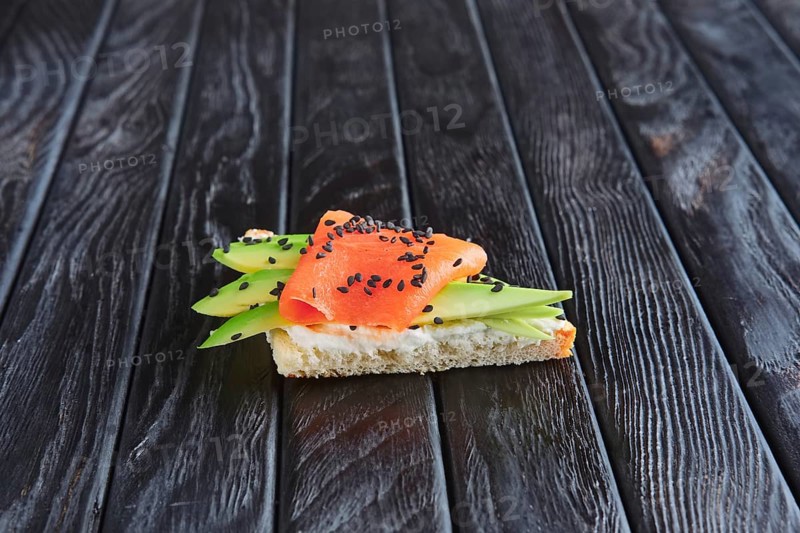 Appetizer for reception. Sandwich with smoked salmon