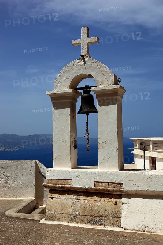 Bell tower of the monastery in the mountains near the coastal road to Agios Nikolaos